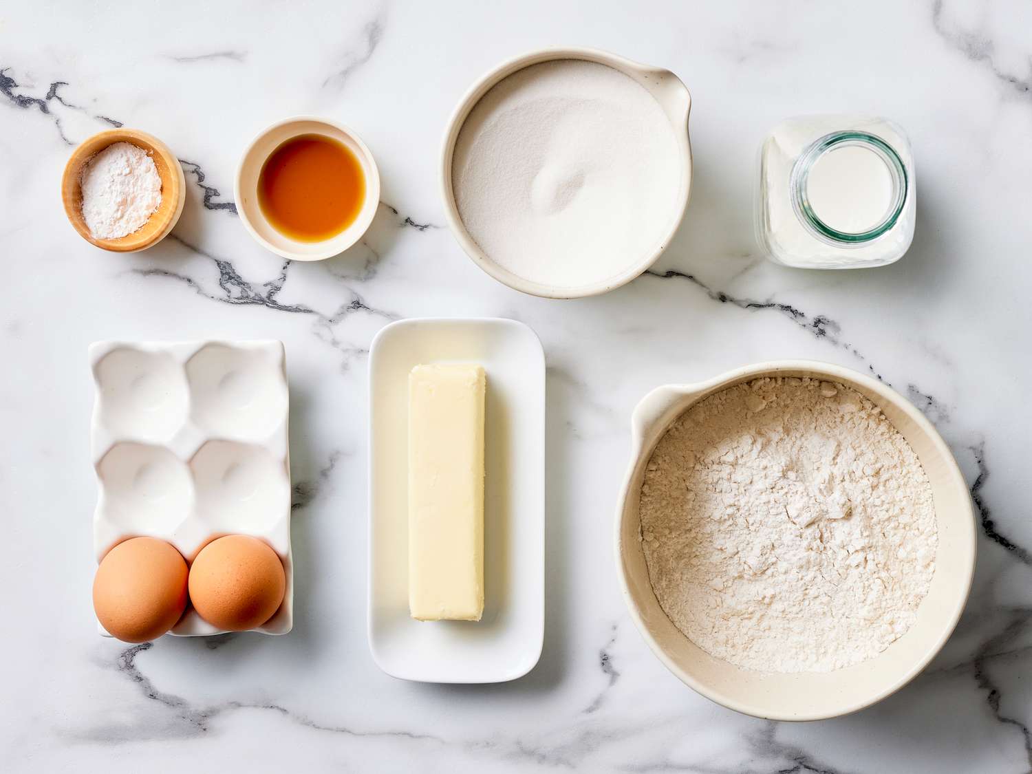 Cake ingredients, all separated on a counter