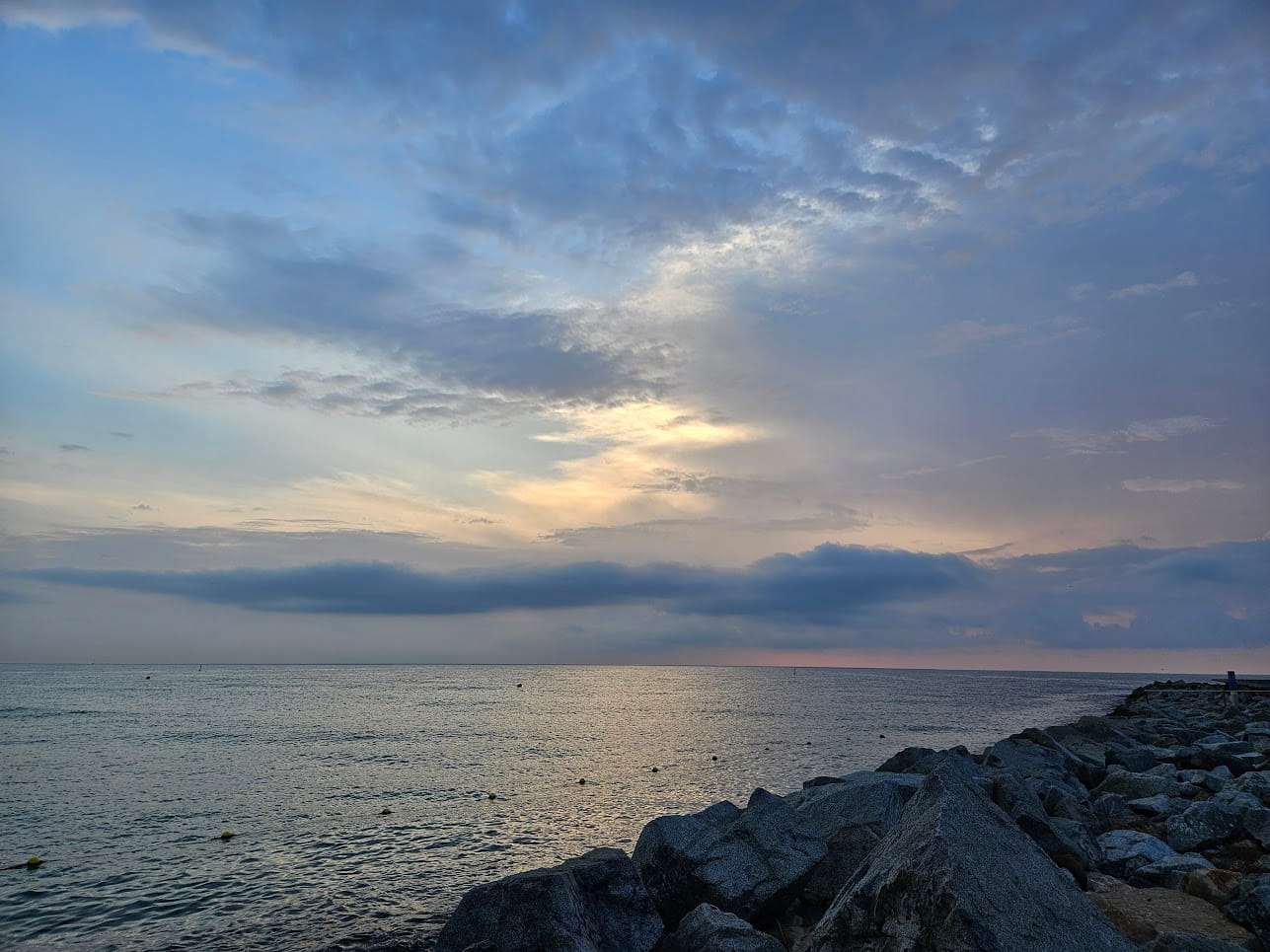 Barcelona sunrise on the sea